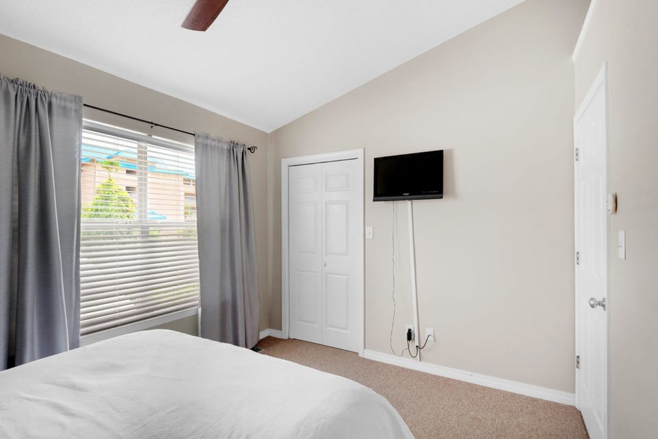 Guest bedroom with flat screen TV