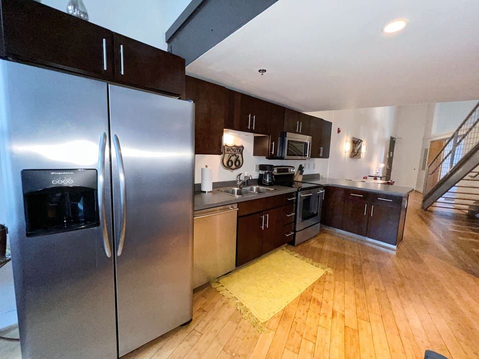 Full kitchen with standard coffee maker.