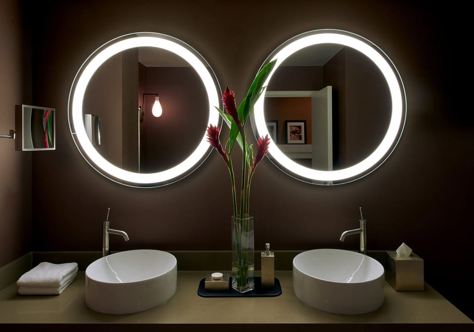 Combined shower/tub, designer toiletries, hair dryer, bathrobes
