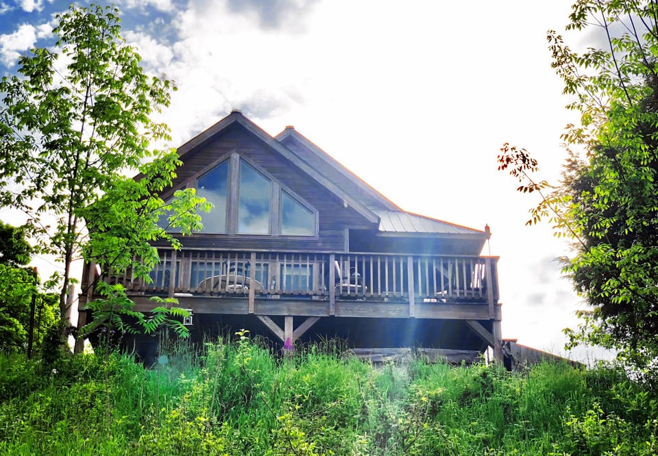 The view from the valley looking up at our A-frame and back deck!