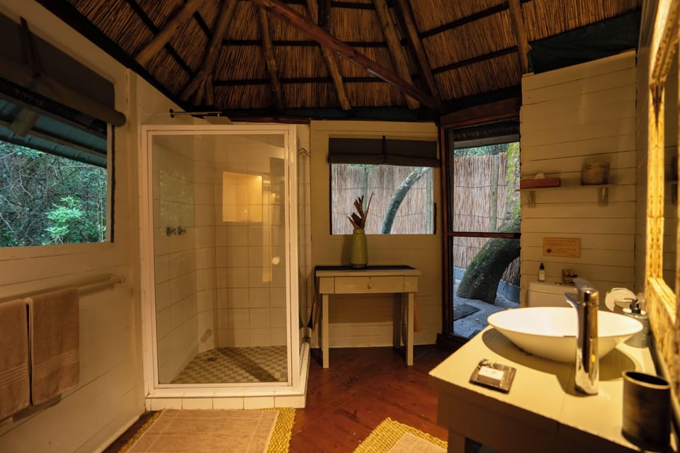 Separate tub and shower, deep soaking tub, free toiletries, towels
