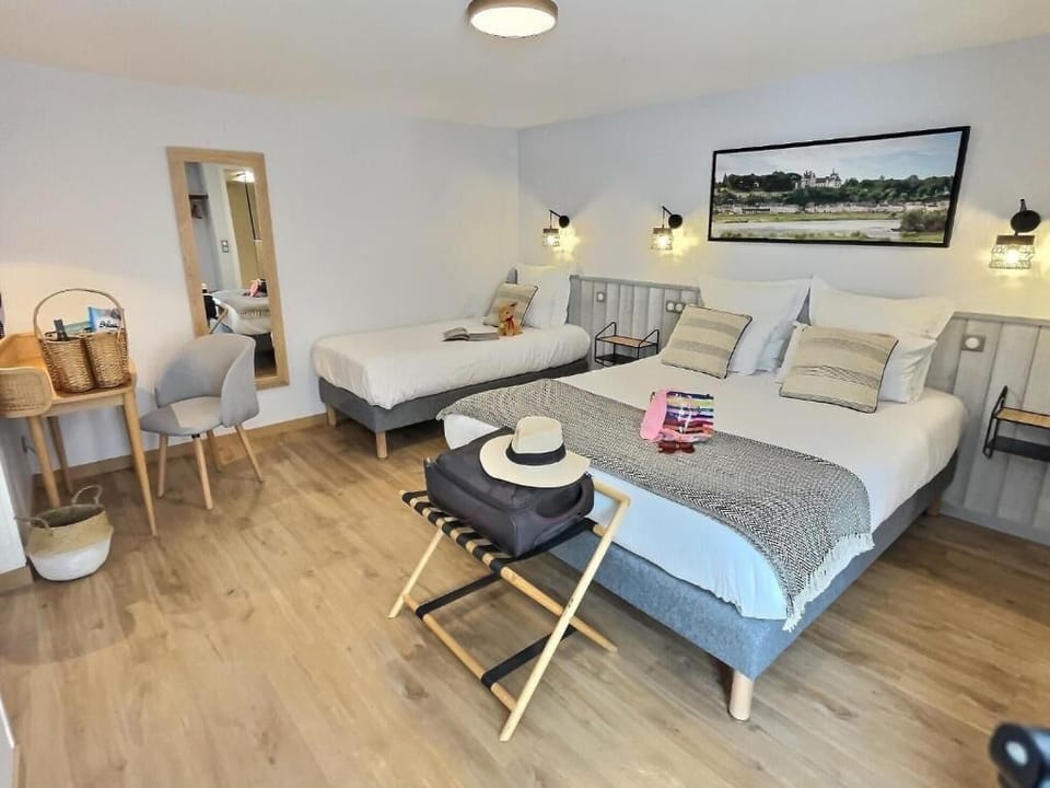 Triple Room, Courtyard View | Desk, cribs/infant beds, free WiFi, bed sheets