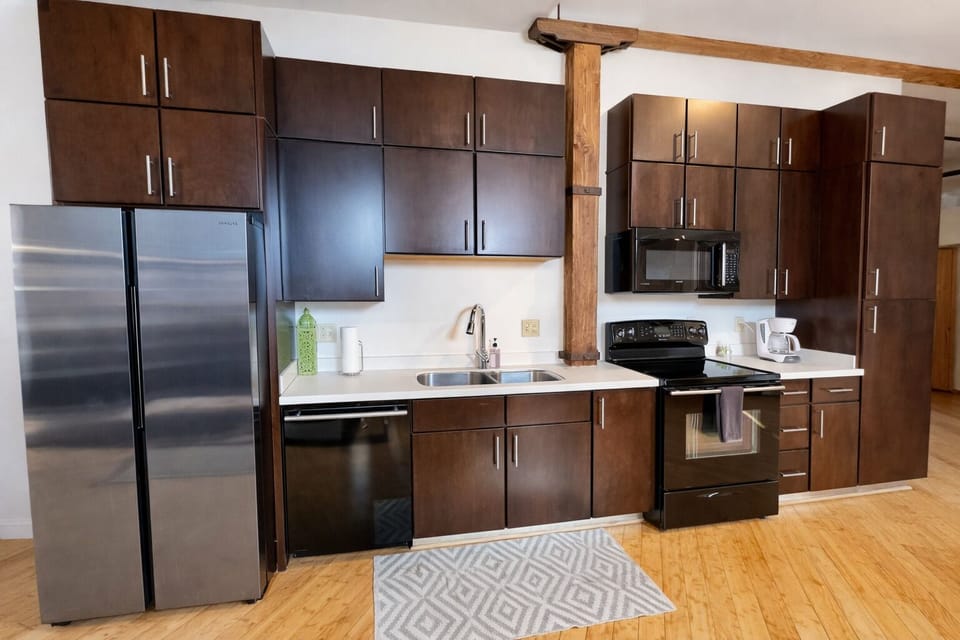 Full kitchen with standard coffee maker.