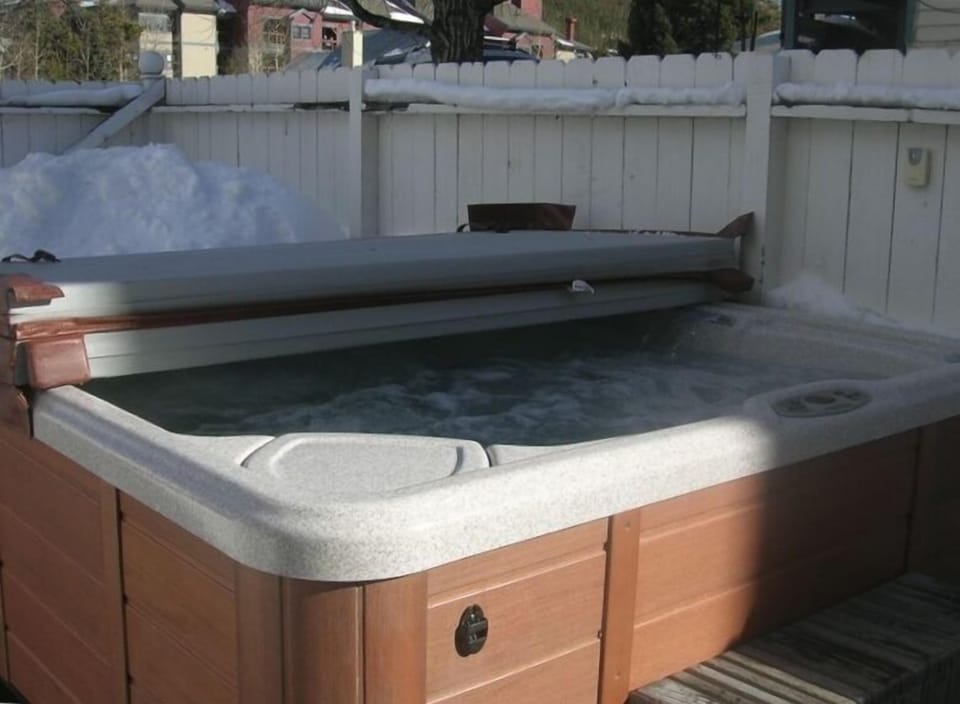 Large private hot tub in private yard.

