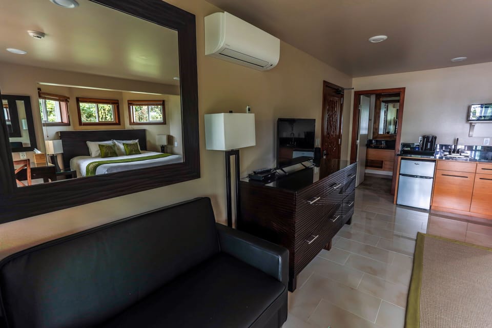 Kitchenette with Keurig Coffee Maker, Microwave, and Mini Refrigerator.