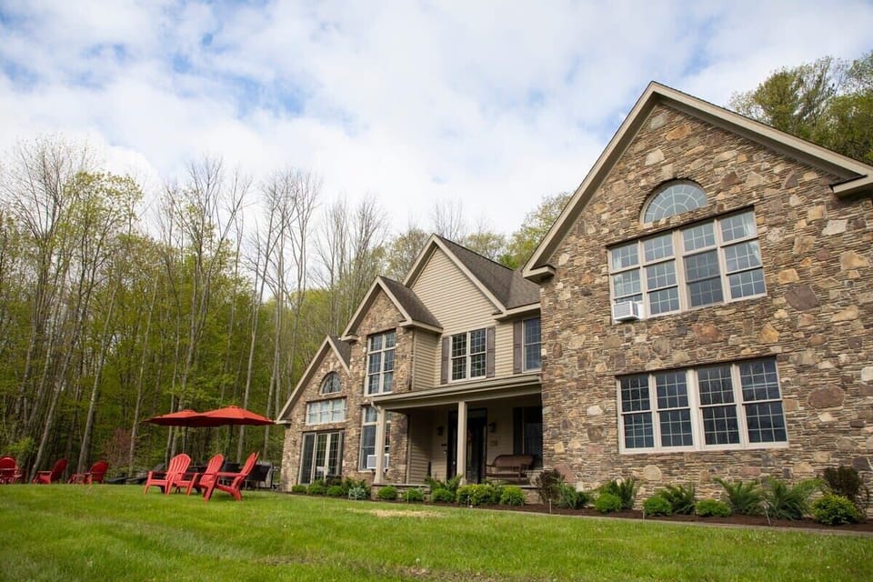 Make the most of the outdoor space with a picnic table, grill, and a selection of yard games, offering plenty of options for fun, relaxation, and outdoor dining.