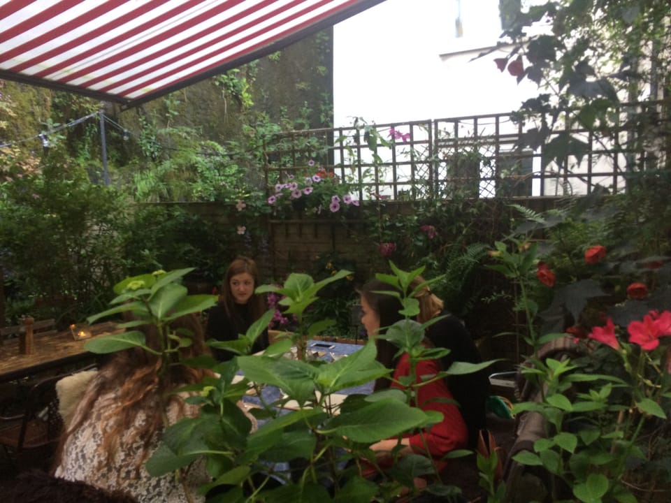 Having a drink in Garden of Black Pig Restaurant