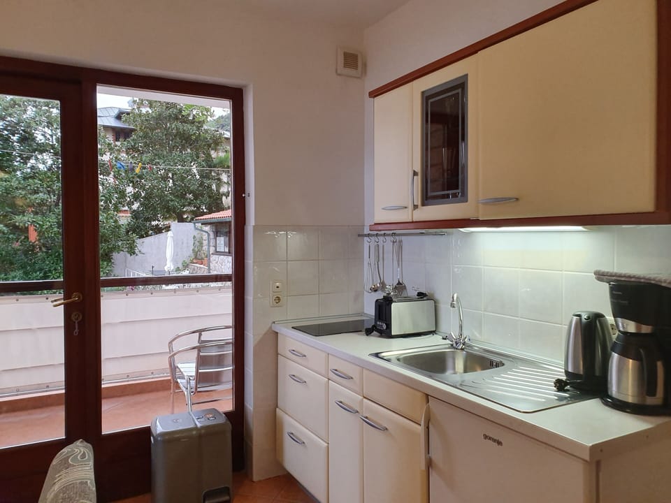 Apartment, Balcony, Sea View | Private kitchen | Fridge, coffee/tea maker