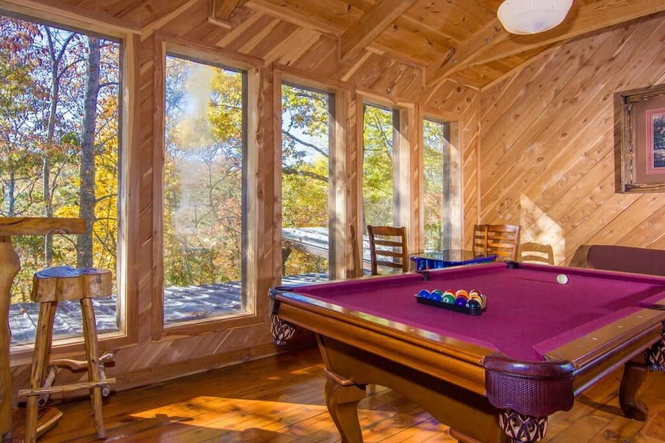 Loft With Pool Table, 60 Game 2 Player Arcade Table, Futon, & Log Table & Chairs