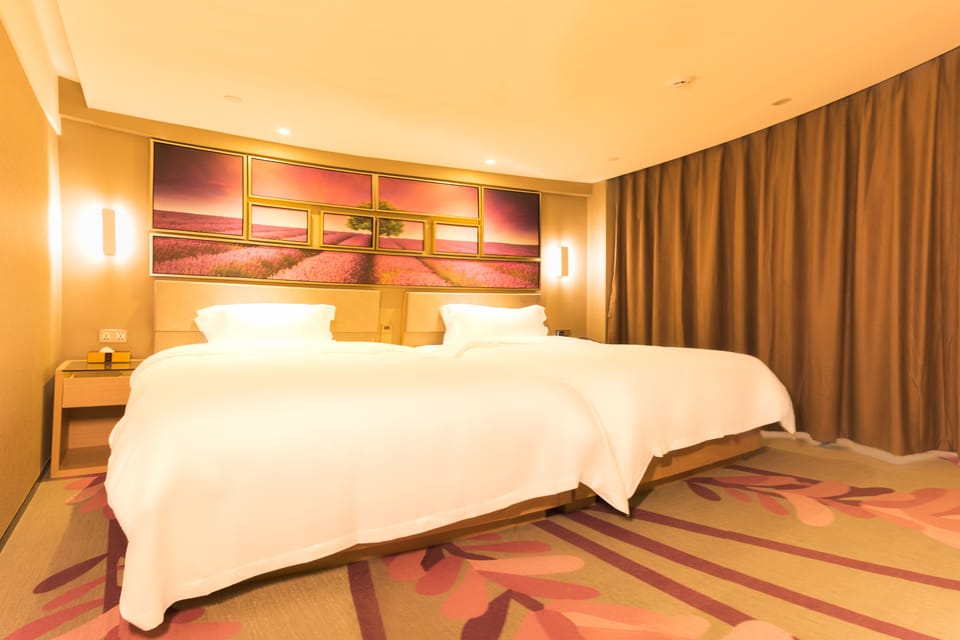 Deluxe Family Room | Minibar, desk, blackout drapes, WiFi (free)