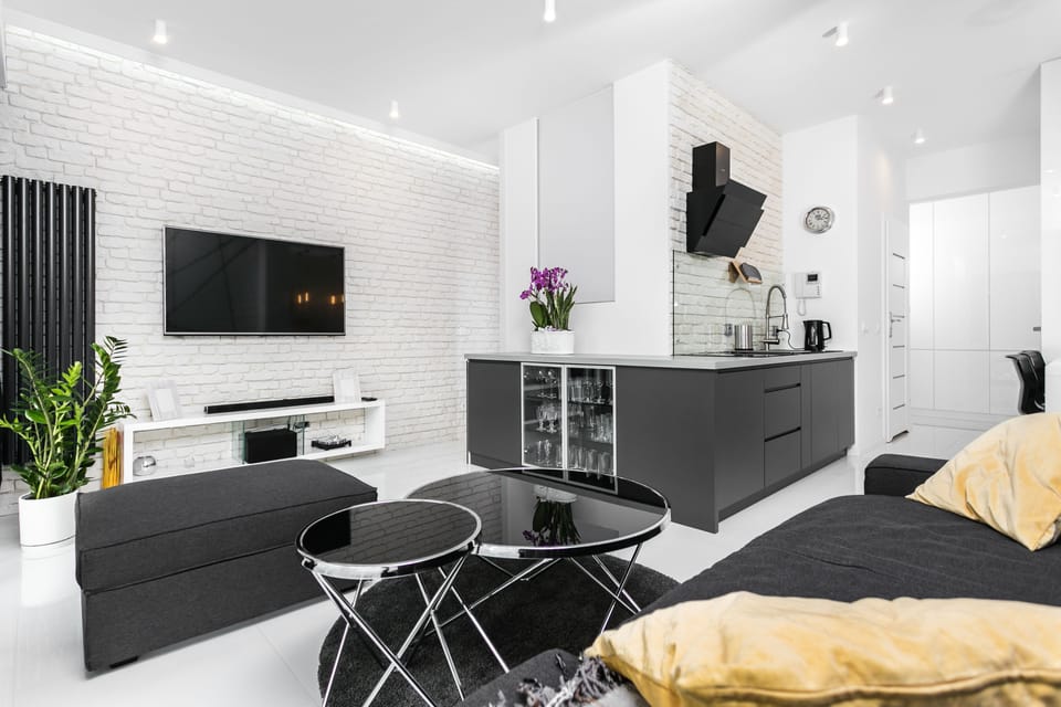 Deluxe Apartment | Living room | Flat-screen TV, Netflix