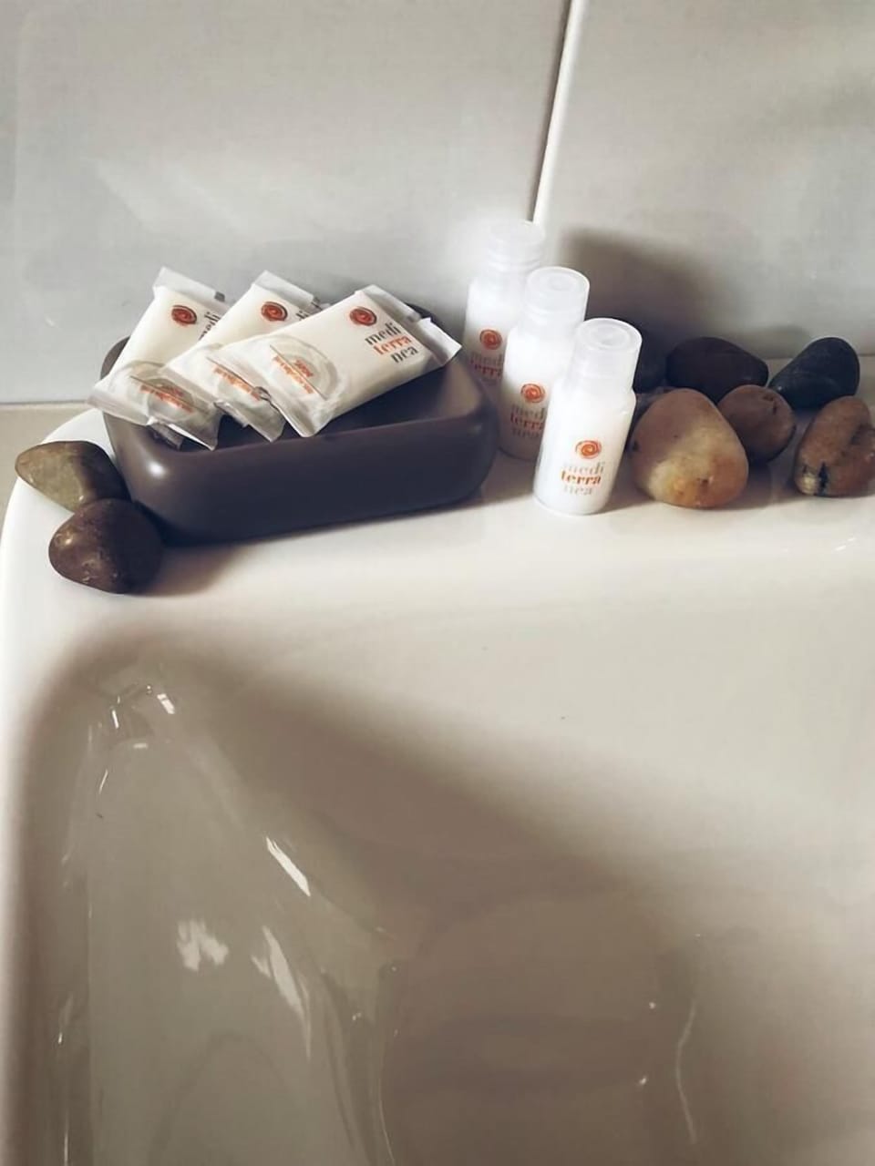 Shower, rainfall showerhead, designer toiletries, hair dryer