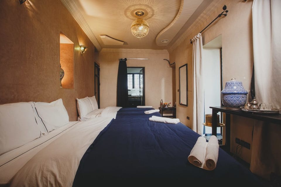 Family Suite, Non Smoking | Minibar, in-room safe, blackout drapes, iron/ironing board