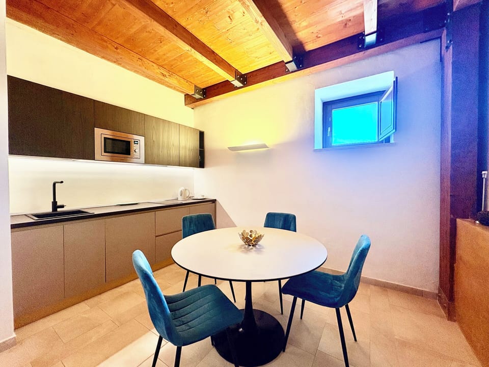 Family Studio Suite, Kitchen, Ground Floor | Private kitchen | Full-size fridge, microwave, stovetop, espresso maker