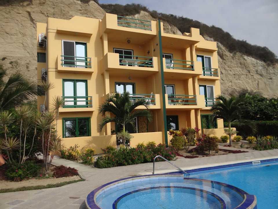 Beach and pool side of condo building