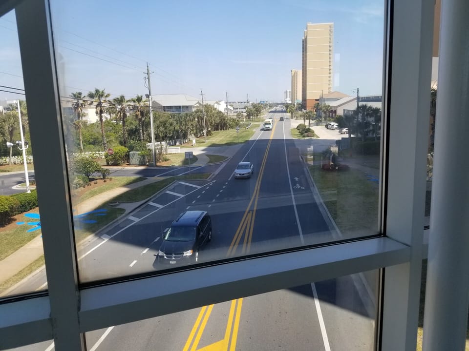 covered skyway walkway to both lobby parking and tower