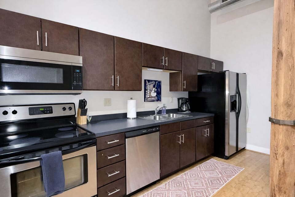 Full kitchen with standard drip coffee maker.