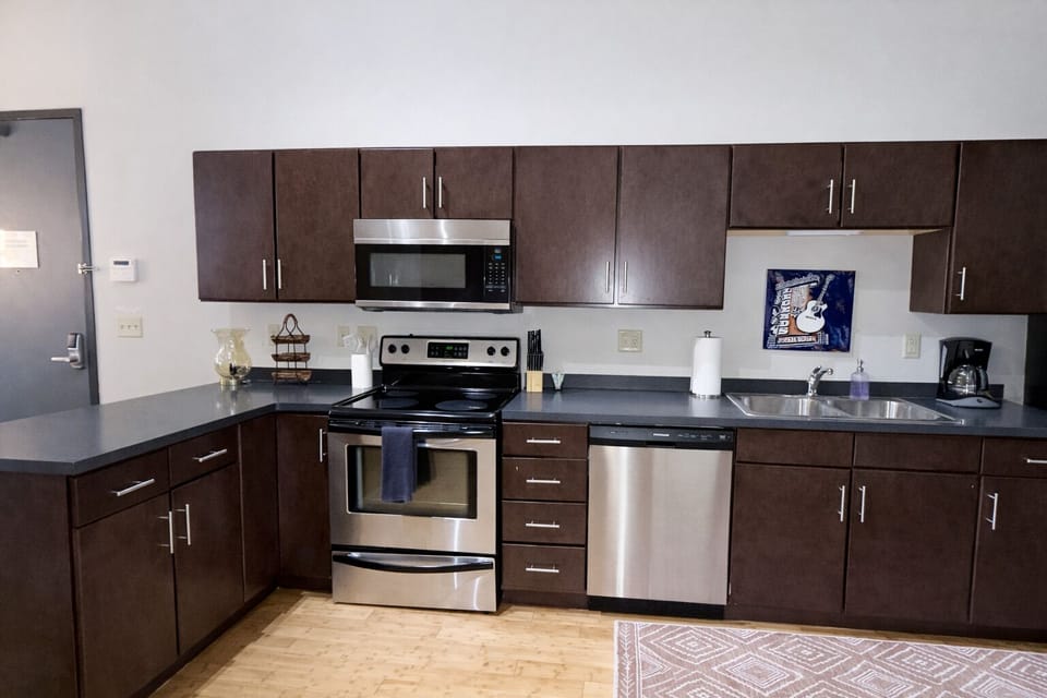Full kitchen with standard drip coffee maker.