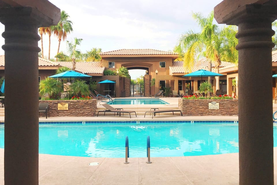 Relax at the two-tier community pool which also includes a hot tub & gas grills