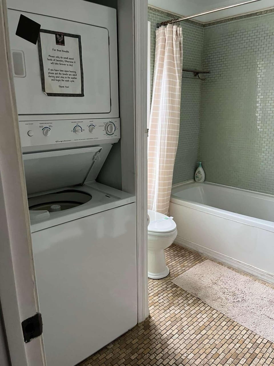 upstairs bathroom-jetted tub, washer/dryer, sink, toilet, heated floor