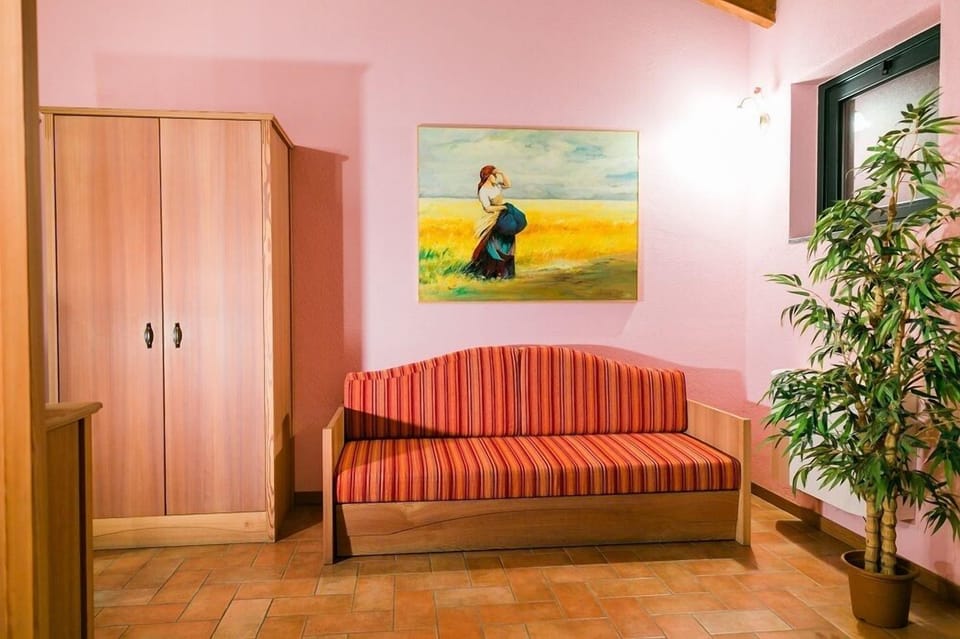 Junior Suite, 1 King Bed with Sofa bed, Accessible | Living area | Flat-screen TV