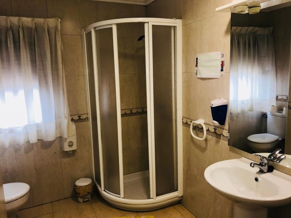Shower, free toiletries, hair dryer, towels