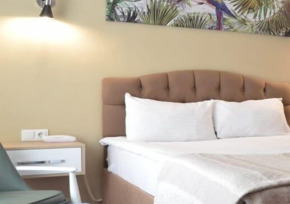 Premium bedding, laptop workspace, iron/ironing board (on request)