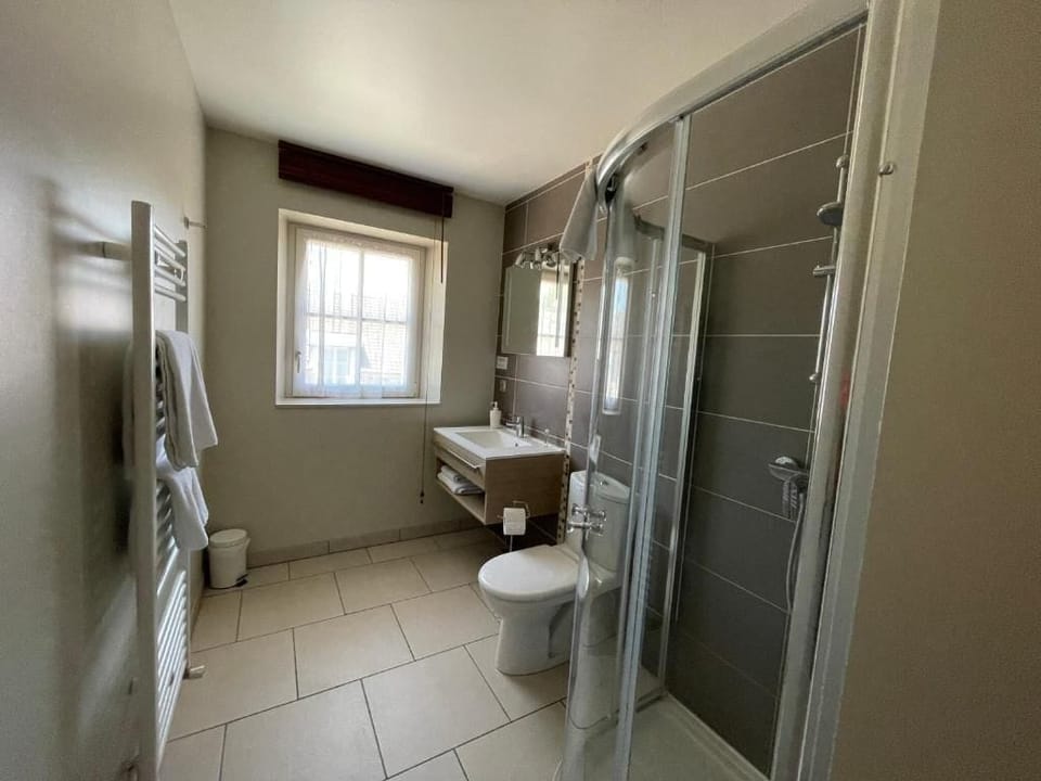 Shower, free toiletries, hair dryer, towels