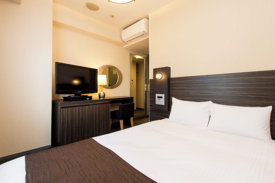 Iron/ironing board (on request), WiFi (free), bed sheets