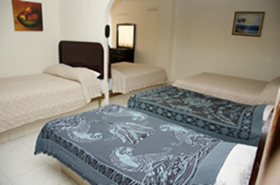 Classic Quadruple Room, 2 Double Beds, Non Smoking | Minibar, in-room safe, iron/ironing board (on request), WiFi (free)
