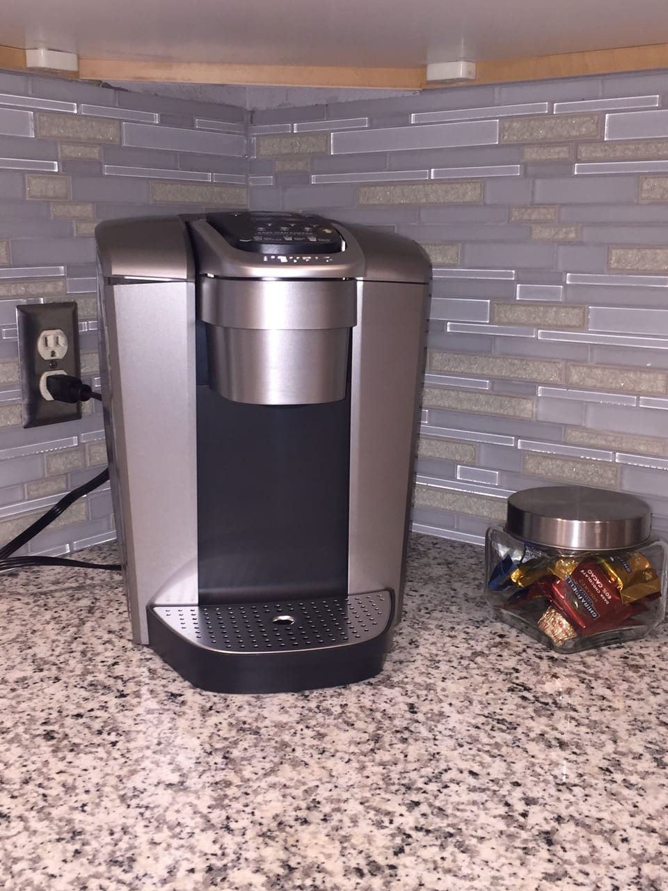 The kitchen includes a Keurig and a traditional coffee maker.