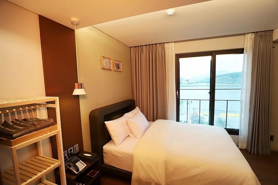 Junior Suite, River View | In-room safe, blackout drapes, free WiFi