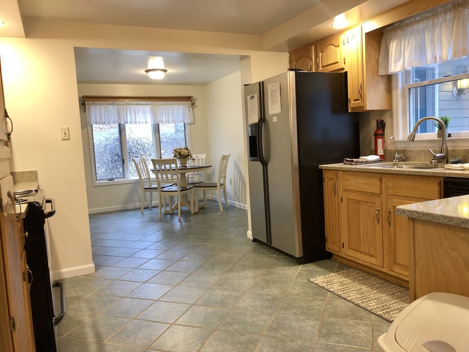 The Kitchen and Breakfast Area with Stainless Appliances