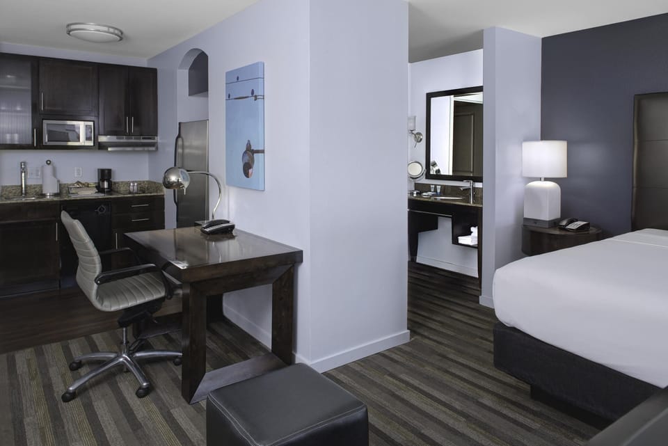 Premium bedding, pillowtop beds, desk, blackout drapes