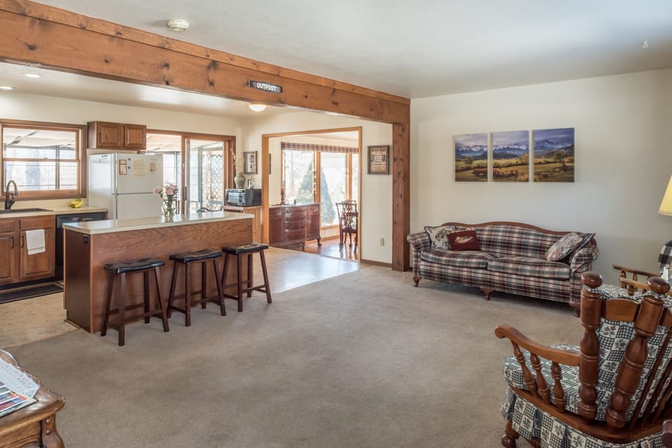 Large open living room & kitchen keeps your group together while preparing meals