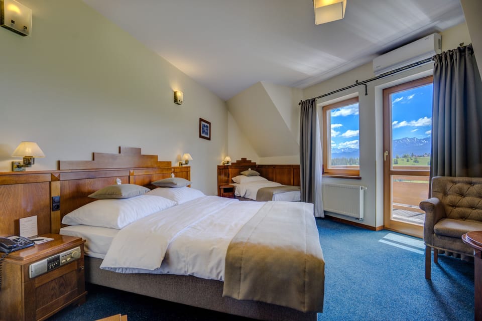 Premium Triple Room, Mountain View | Egyptian cotton sheets, premium bedding, minibar, in-room safe