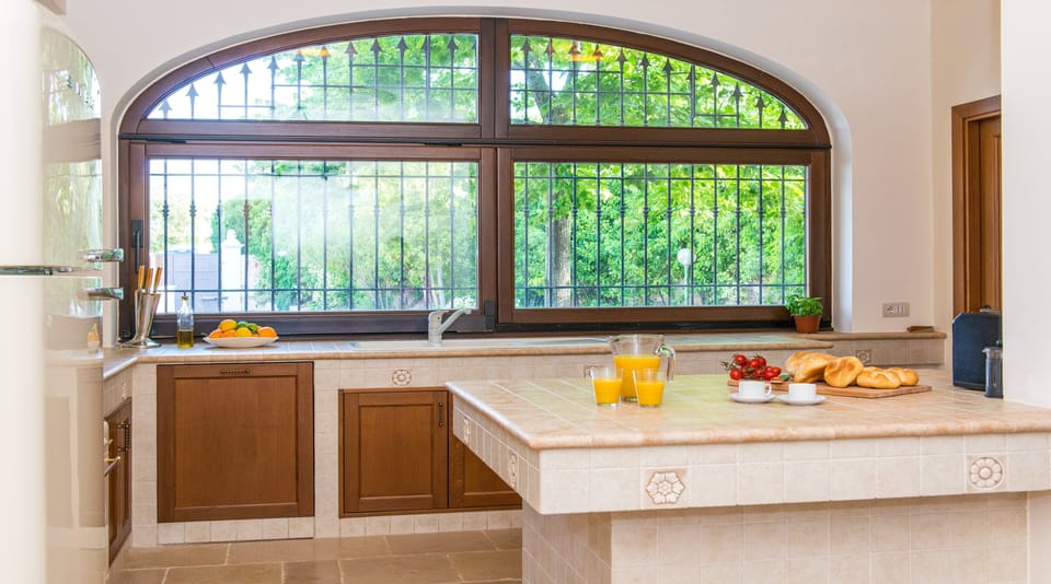 Kitchen island set for breakfast - coffee machine