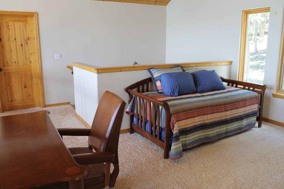 Even room for 2 to sleep with pull out in upstairs loft.