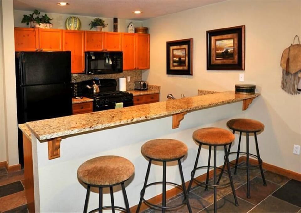 Comfortable seating for 4 with TV trays available in the closet.