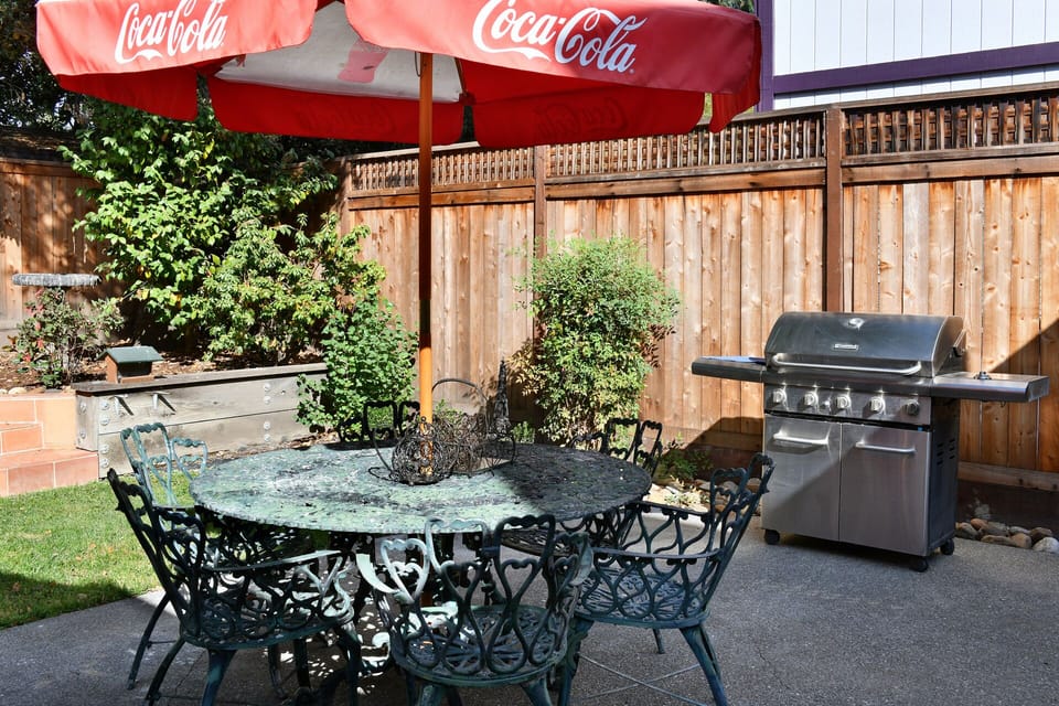 Enjoy a barbecue in the backyard.  Enough seating for 10. 