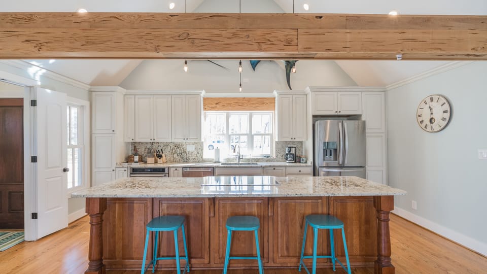 Custom Gourmet Kitchen Open to Living area and Dining 