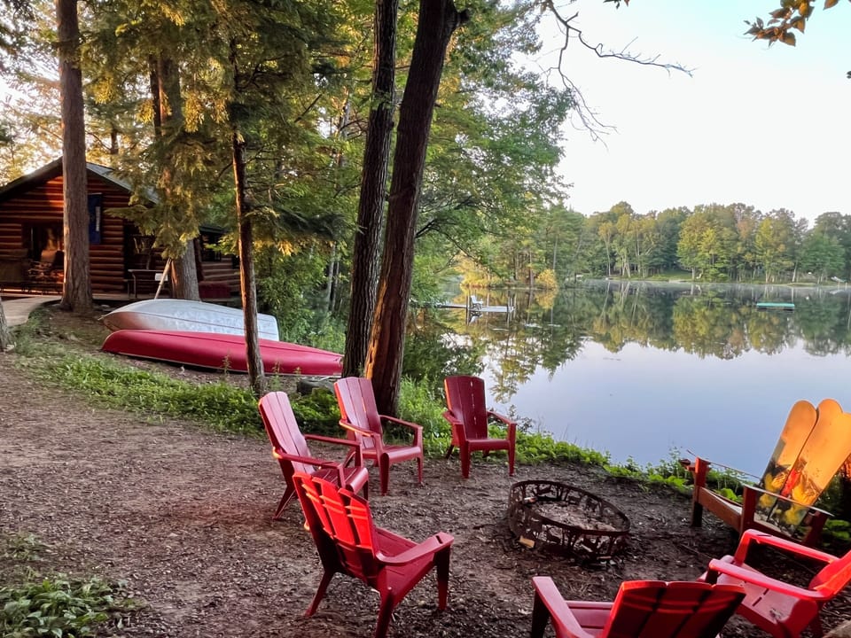 Glassy lake with the sunrise.