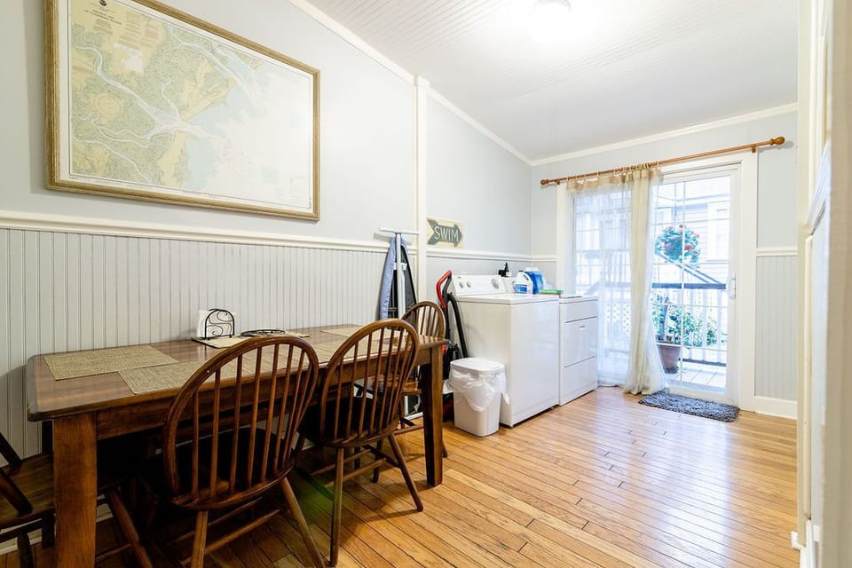 Dining area off of kitchen. The condo also has a washer and dryer
