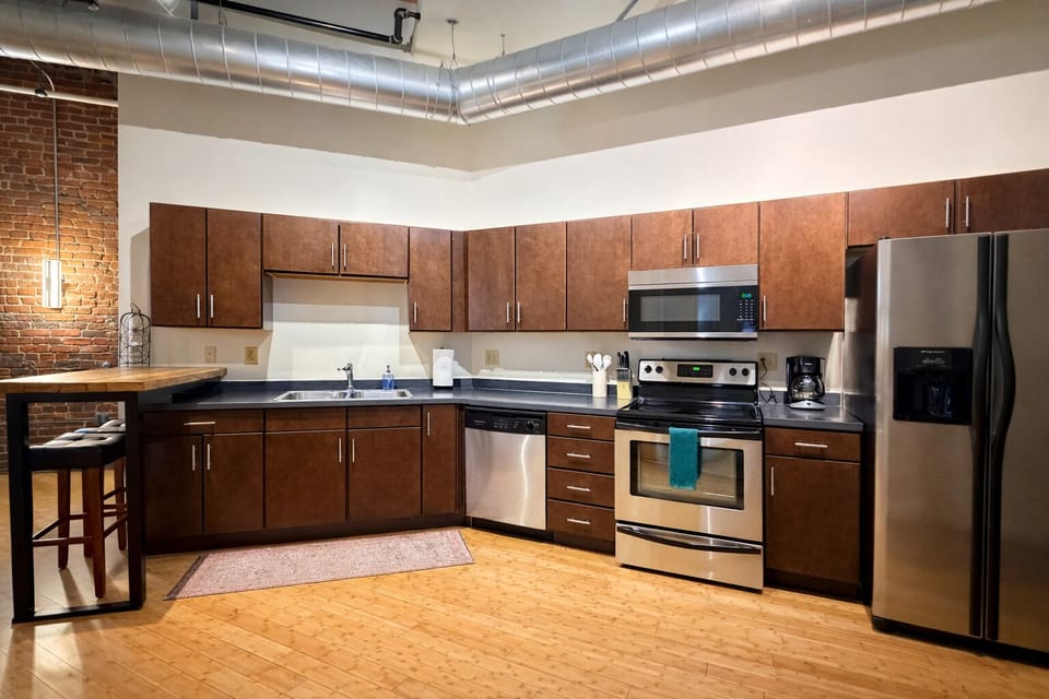 Full kitchen with standard drip coffee maker.