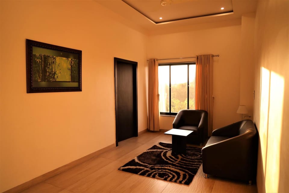 Hazel Suite | Living area | 32-inch LED TV with satellite channels