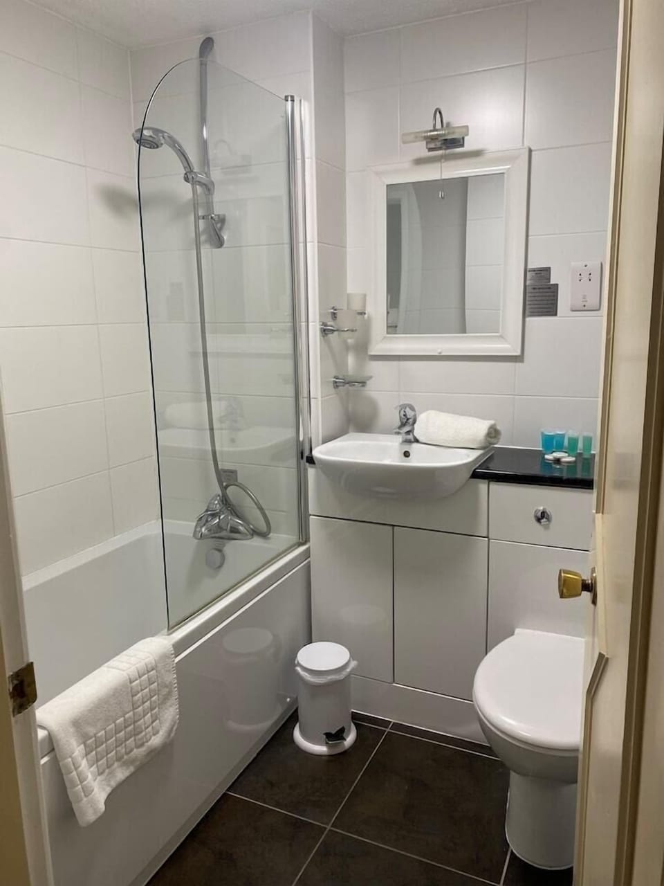 Deep soaking tub, designer toiletries, hair dryer, towels