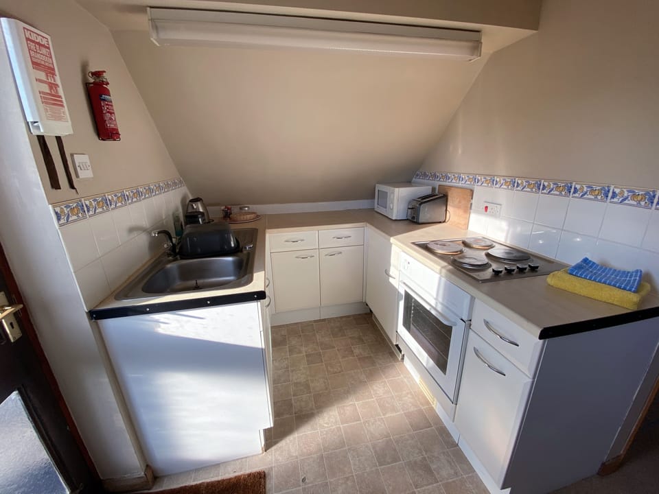 Superior Apartment, Non Smoking, Hill View (The Loft) | Private kitchen | Coffee/tea maker, electric kettle