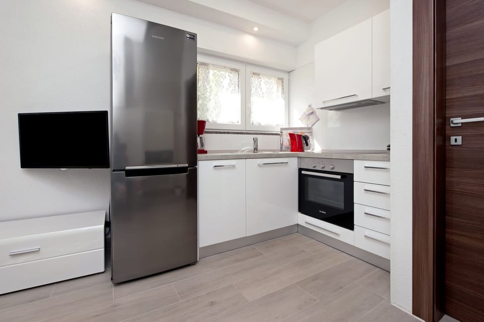 Apartment | Private kitchen | Fridge, microwave, stovetop, coffee/tea maker