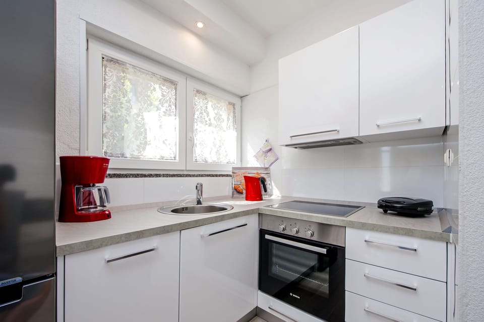Apartment | Private kitchen | Fridge, microwave, stovetop, coffee/tea maker