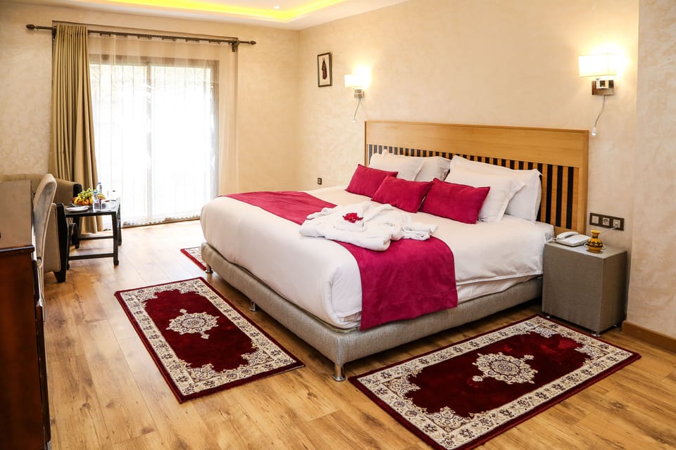 Premium bedding, memory foam beds, desk, blackout drapes